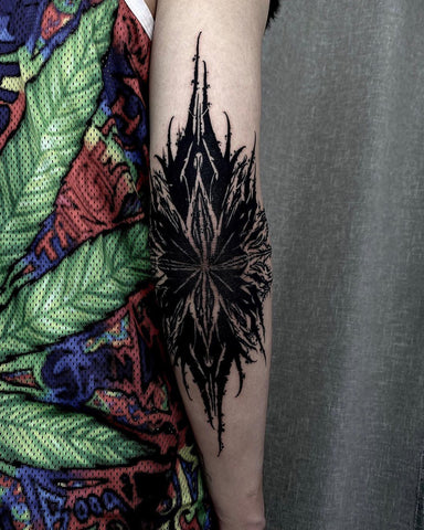 elbow plant tattoo