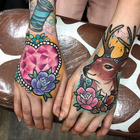 heart diamond flower deer tattoo on the back of the hand