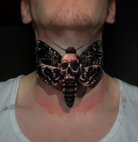 skull butterfly neck tattoo