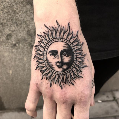 sun hand tattoo