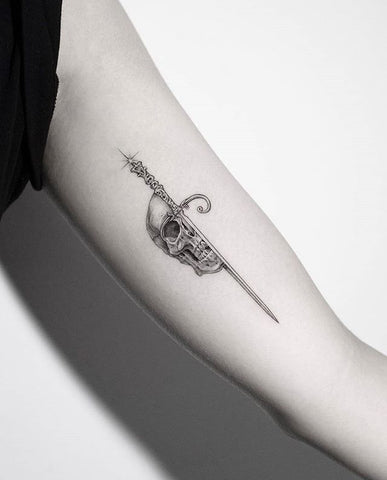 sword skull tattoo