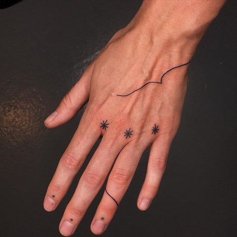 fine line hand tattoo