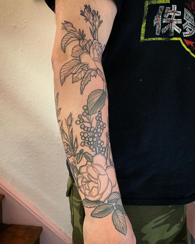 flower plant sleeve tattoo