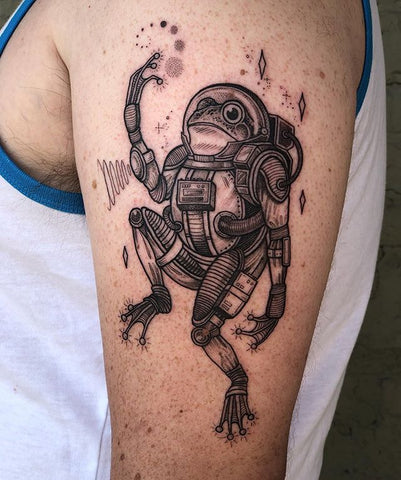 frog arm tattoo