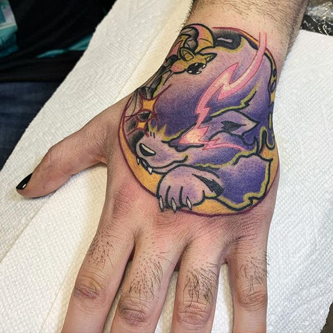 animal hand tattoo