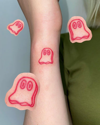 cartoon ghost wrist tattoo