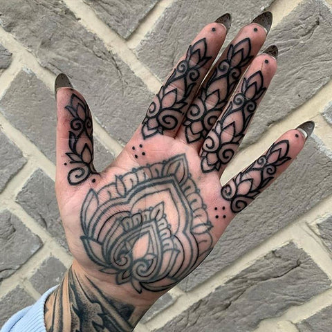 floral hand tattoo