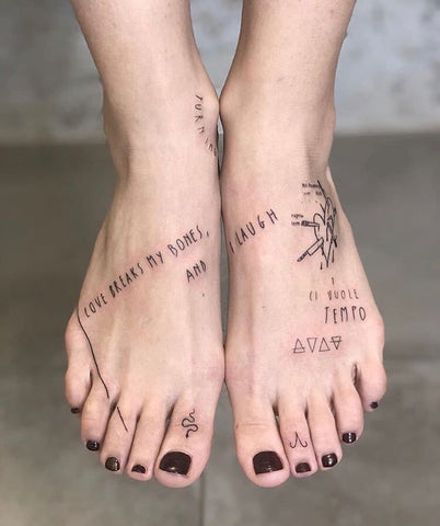 word heart foot tattoo