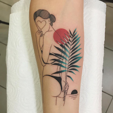 sun leaf woman leg tattoo