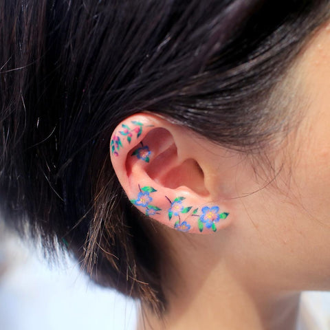 flower ear tattoo