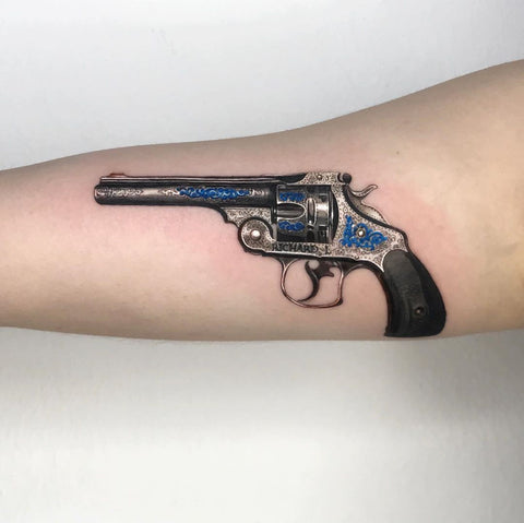 unique metallic gun tattoo