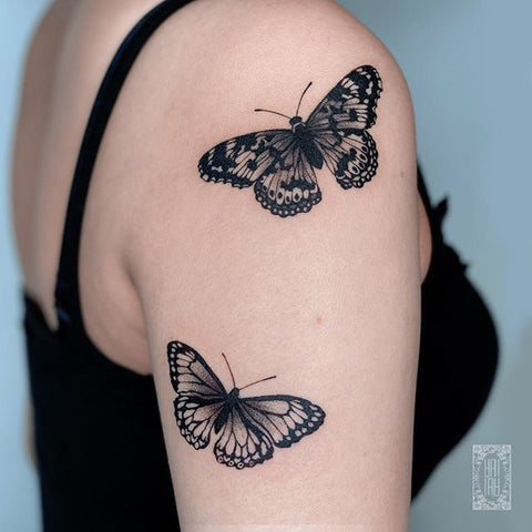 butterfly arm tattoo