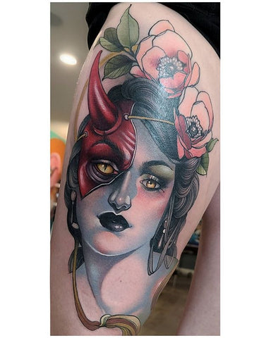 demon woman portrait thigh tattoo