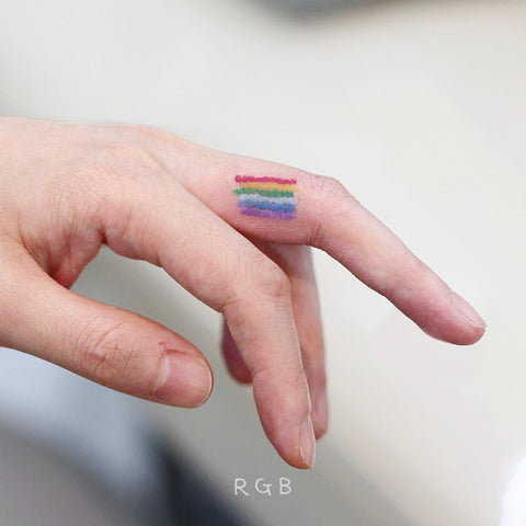 rainbow finger tattoo
