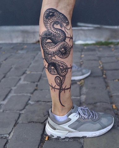 snake animal whole leg tattoo