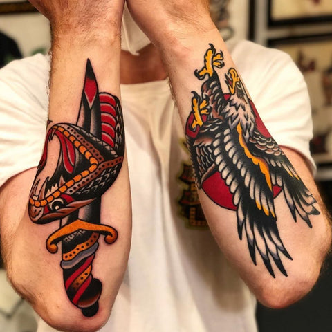 snake eagle tattoo on forearms