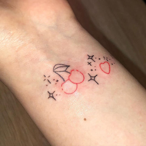 cherry star heart wrist tattoo