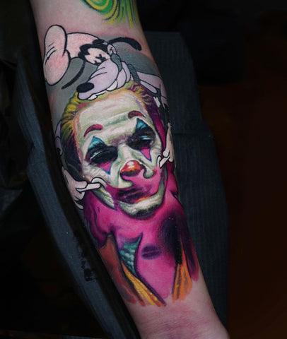 Goofy and joker tattoo