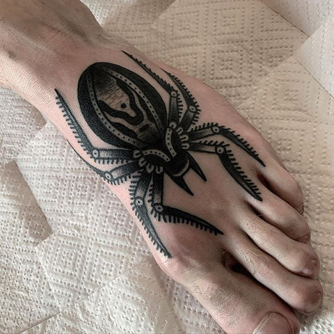 spider foot tattoo