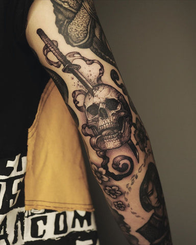 skull sword sleeve tattoo