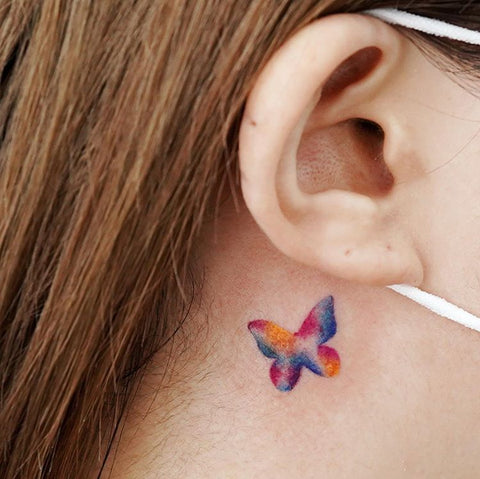colorful butterfly neck tattoo