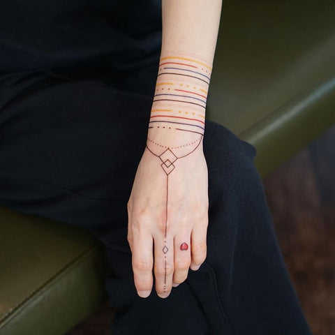 line wrist tattoo