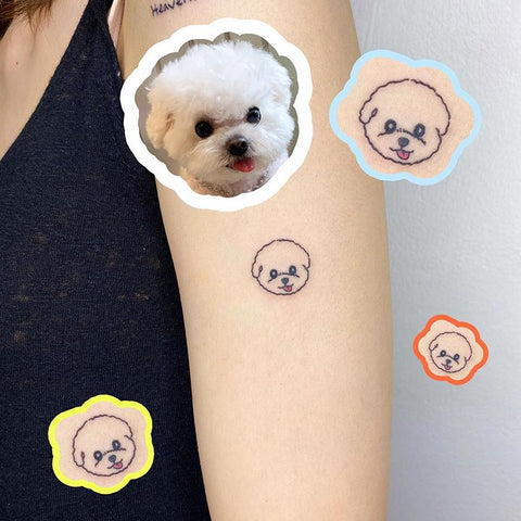 tiny dog arm tattoo