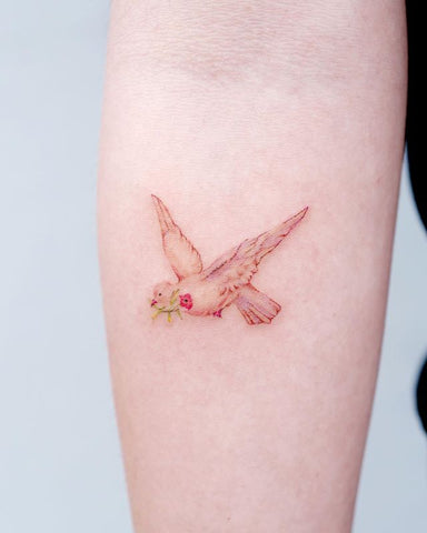 small bird arm tattoo
