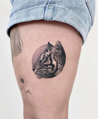 Circular tiger tattoo art