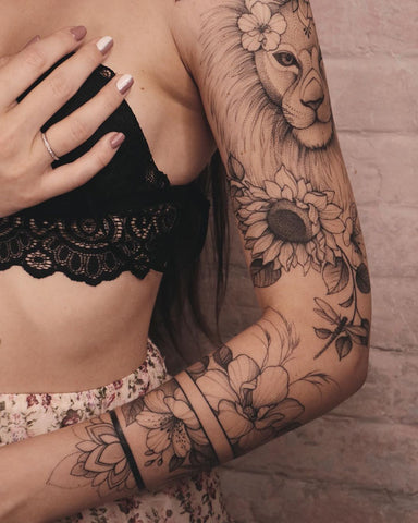 lion arm sleeve tattoo