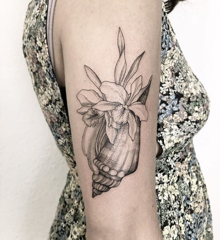 flower conch arm tattoo design