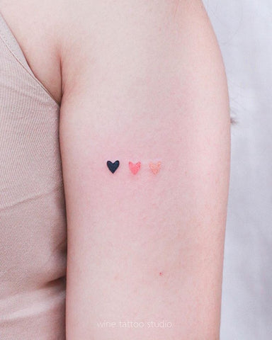 tiny heart tattoo
