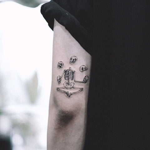 several skull skeleton tattoo