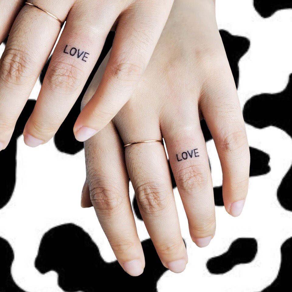 word couple tattoo