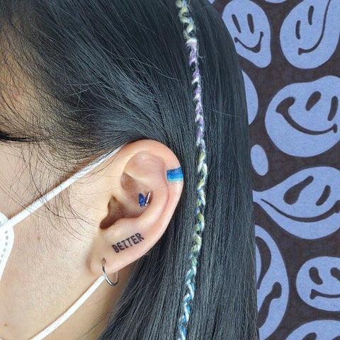 simple ear tattoo