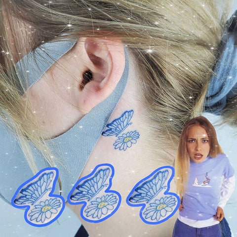 butterfly and flower etattoo behind the ear