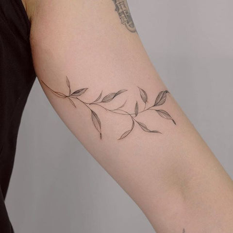 leaf tattoo design on the arm