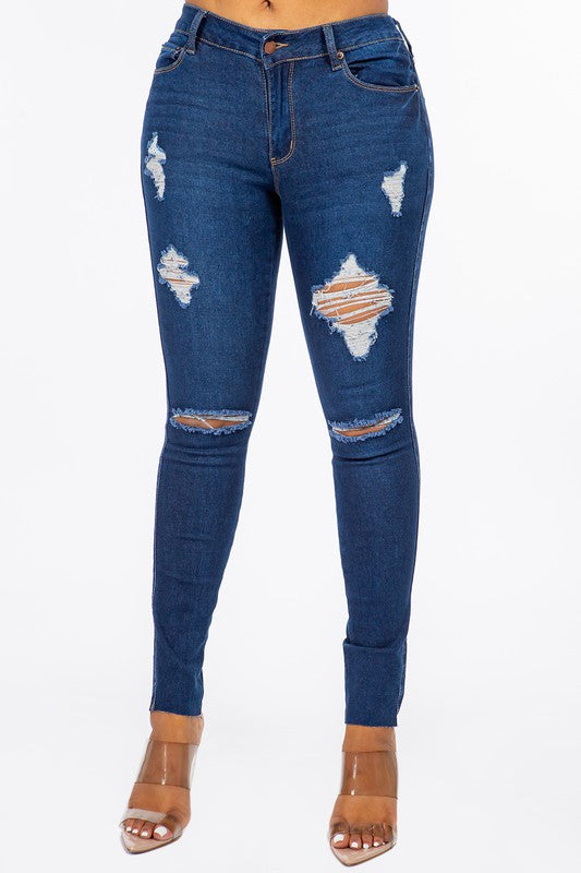 Distressed Mid Rise Skinny Jeans