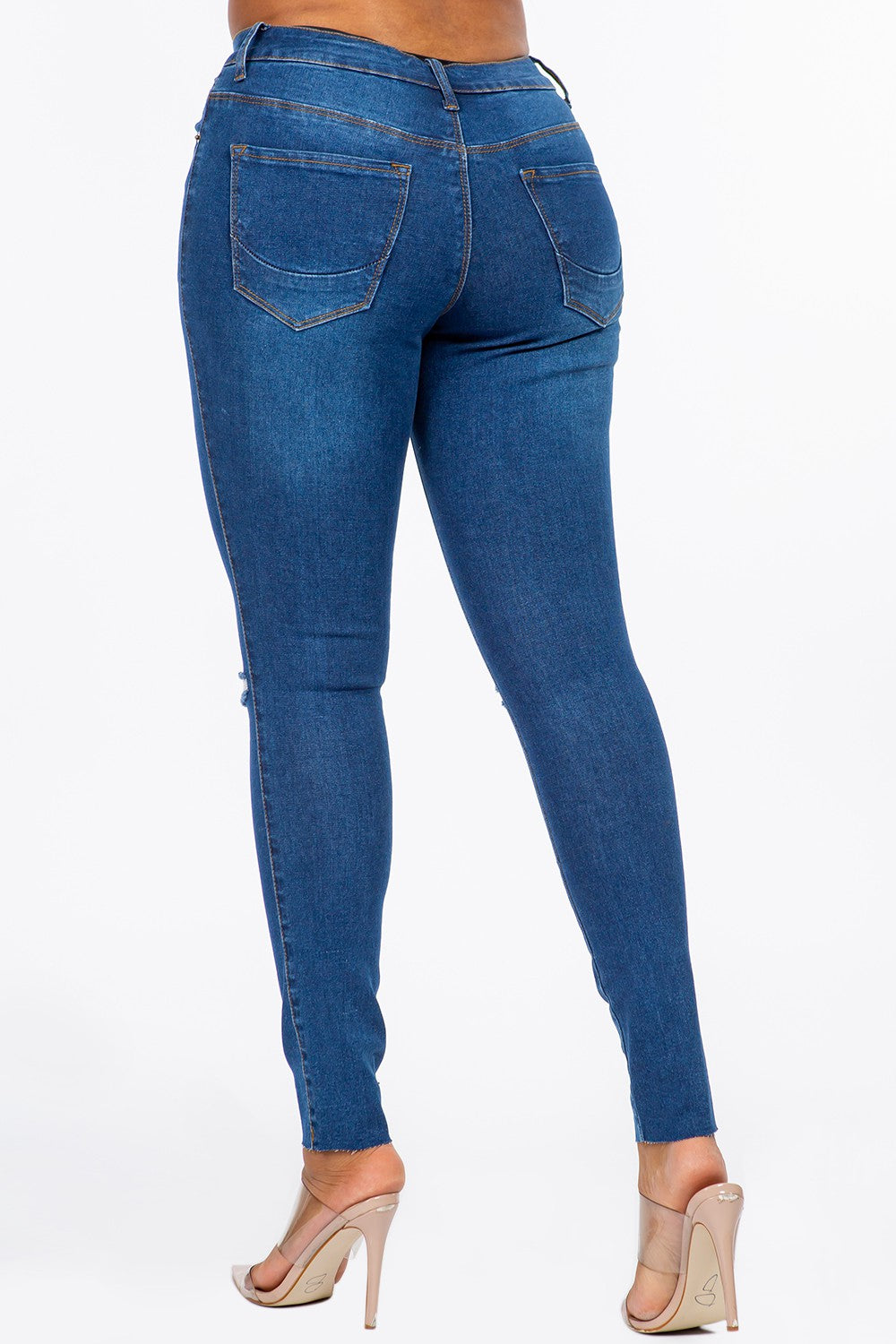 Distressed Mid Rise Skinny Jeans