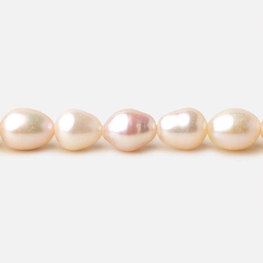  7.5x6-8x5mm Rose' White straight drilled Oval freshwater pearls 15 inch 52 pieces A 