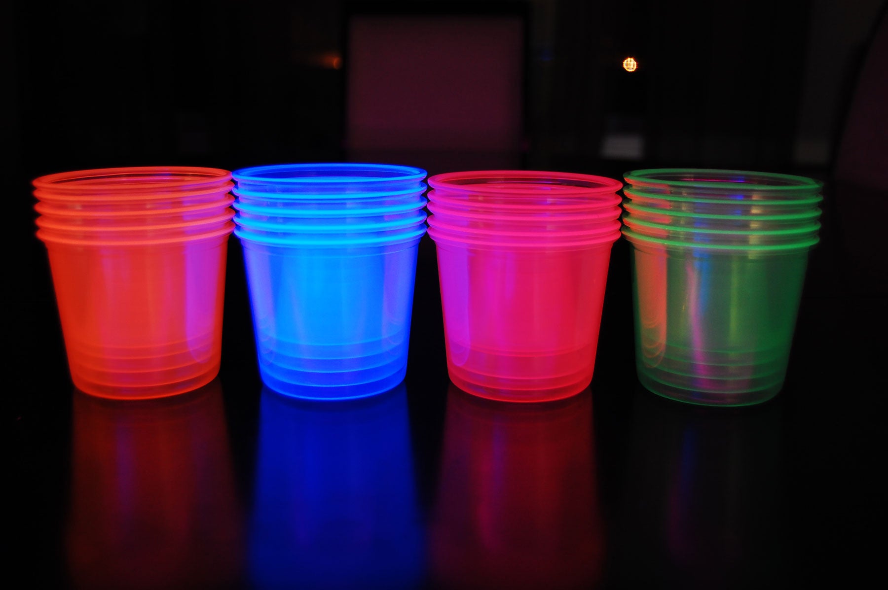 4 Ounce 20ct UV Blacklight Reactive Soft Plastic Bomber Glow Party Shot Glass Cups