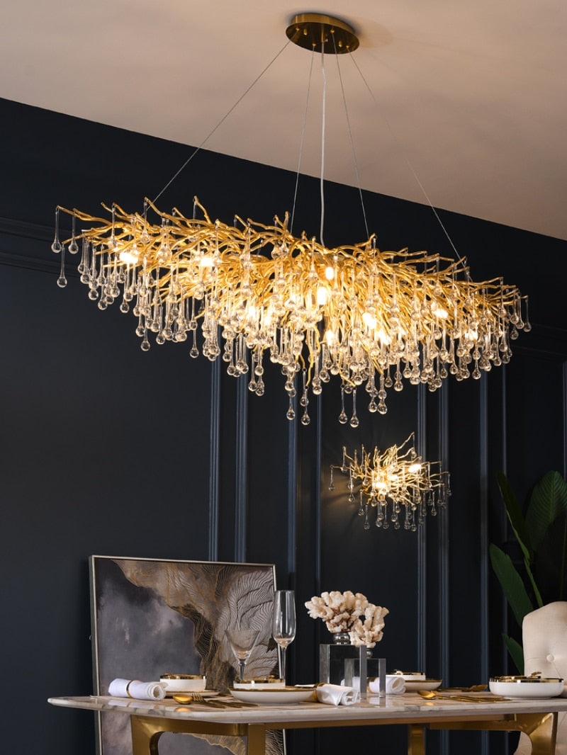 IDEA(HK) LIGHTING - ooze - "-What on earth is that majestic being hanging from the ceiling?"  Majestic crystal chandelier. Unique lighting for dining rooms, living areas, entrance halls, hotel areas, restaurants, etc.    K9 crystals with silver/gold metal plated aluminum frame. - A work of art.  2 sizes - 2 colors L120cm: L120xW50xH35cm, 12-25m2 L160cm: L160xW55xH35cm, 16kg, 15-30m2