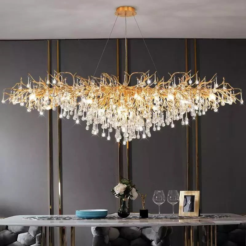 IDEA(HK) LIGHTING - ooze - "-What on earth is that majestic being hanging from the ceiling?"  Majestic crystal chandelier. Unique lighting for dining rooms, living areas, entrance halls, hotel areas, restaurants, etc.    K9 crystals with silver/gold metal plated aluminum frame. - A work of art.  2 sizes - 2 colors L120cm: L120xW50xH35cm, 12-25m2 L160cm: L160xW55xH35cm, 16kg, 15-30m2