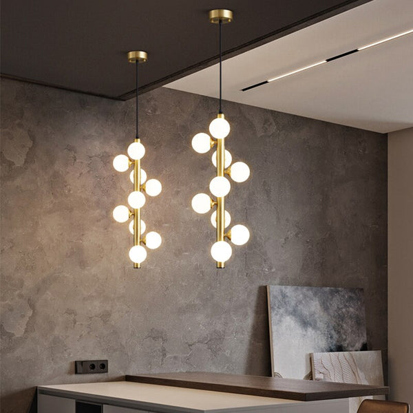 IDEA(HK) LIGHTING - Molekyl - Transform your living space into a modern, inviting ambiance with Molekyl's simple LED Chandelier. This sleek, contemporary design is perfect for any interior, from a grand staircase to a cozy bedroom. Its unique polished copper finish will add both style and illumination to any room in your home.