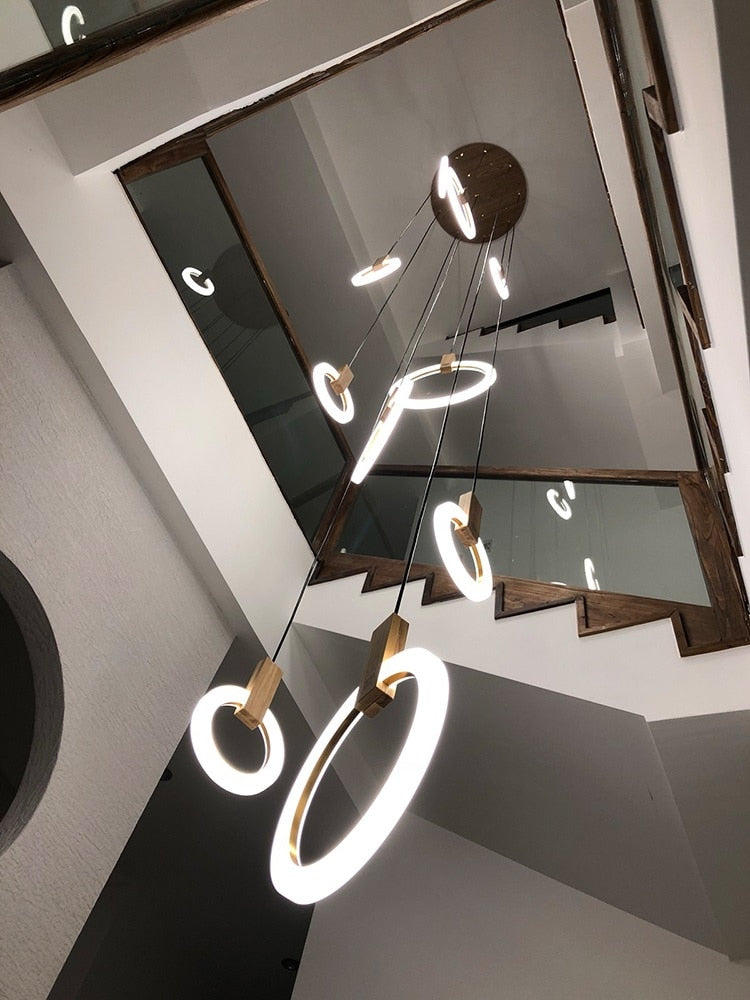 IDEA(HK) LIGHTING - Halo - Modern hanging stair LED chandelier. Perfect for creating a mood in any corner or in a stair. Aluminum/acrylic rings. Specifications Light Source LED Bulbs Base Type 2G11 Is Bulbs Included Dimmable Switch Type Power Source AC, 110-240V Lighting Area Coverage Installation Type Semiflush Mount Body Material Acrylic Warranty 2 years Certification CCC, CE, CQC, FCC, GS, LVD, PSE, ROHS, SAA, UL