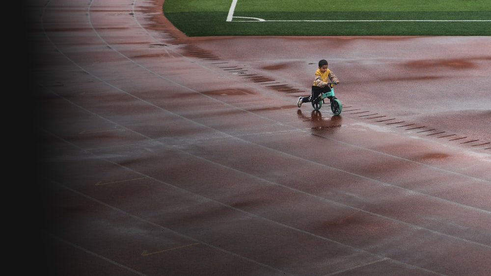 Paint By Numbers | Changsha - Boy In Blue Shirt Riding Bicycle On Track Field During Daytime