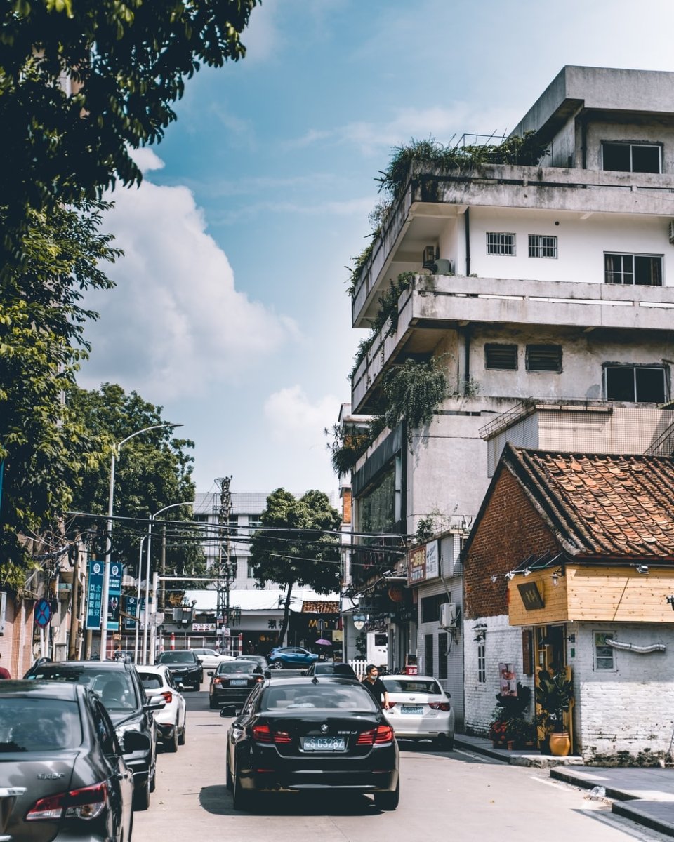 Paint By Numbers | Dongguan - Cars Parked On Side Of The Road Near Buildings During Daytime