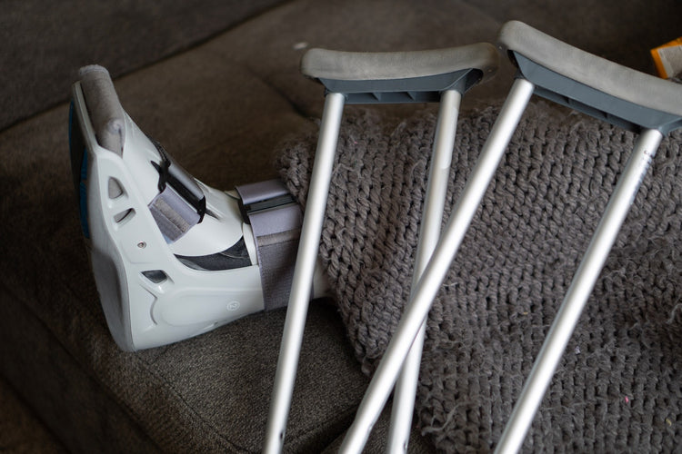 a crutch near a broken foot