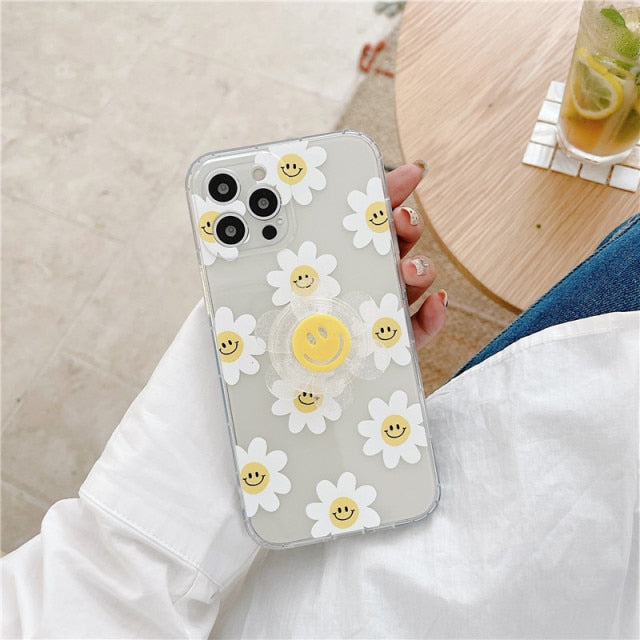 iPhone case with a see-through daisy grip holder