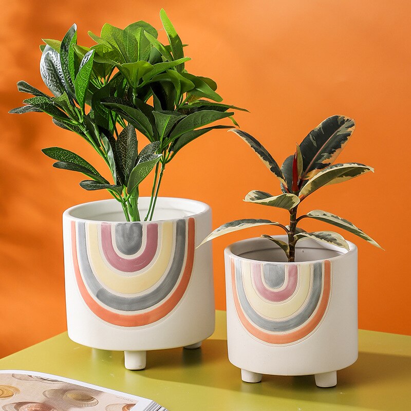 Cute plant pots with drainage hole